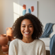 Portrait of a smiling young woman in her 20s, looking confidently at the camera.